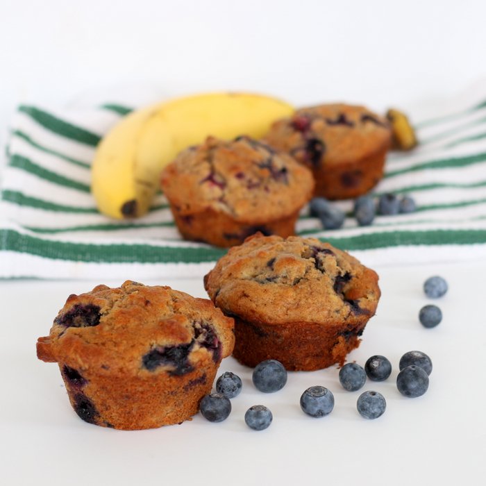 FashionablyEmployed.com | Blueberry Banana muffins with whole wheat, oats, and coconut oil. | Make ahead breakfast idea to streamline the morning. | Working mom blog for busy moms long on ambition and short on time, balancing career, family, style and a little time for ourselves. 