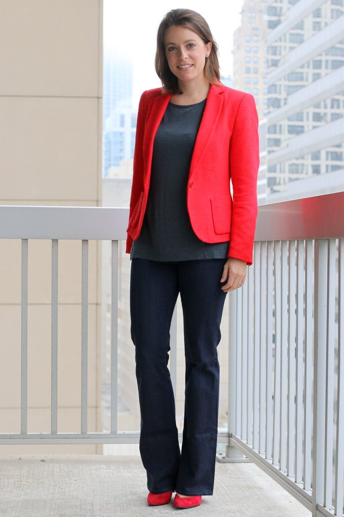 FashionablyEmployed.com | Simple and sustainable work wear style for the everyday professional woman | Seventies style is back; Flared jeans at the office for casual Friday | Poppy thrifted blazer, gray tank, thrifted flared jeans, red heels | fall style wear to work, office outfit idea
