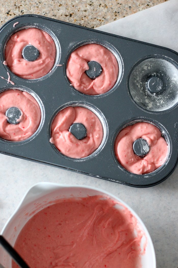 FashionablyEmployed.com | Chocolate Covered Strawberry Donuts | A quick and easy recipe that looks far fancier than it really is, great gift idea for Valentine's Day