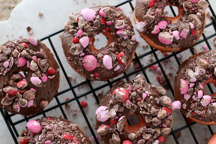 FashionablyEmployed.com | Chocolate Covered Strawberry Donuts | A quick and easy recipe that looks far fancier than it really is, great gift idea for Valentine's Day