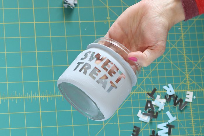 Who doesn't love a cute little candy jar? Check out this quick and easy tutorial, including a video, to upcycle this old mason jar and make into something new and special | DIY candy jar tutorial