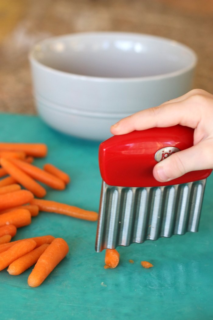 Want to get your little ones in the kitchen and start their appreciation of healthy food young? Check out this post with a little kitchen hack to get children even as young as toddlers involved in meal prep.