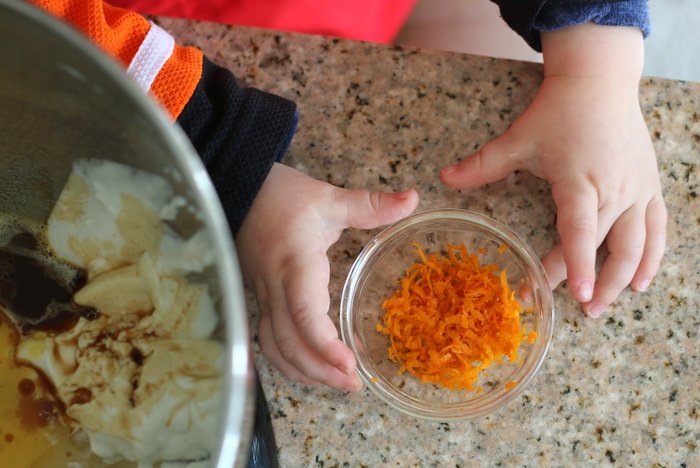 Want to teach your kids to enjoy and appreciate all kinds of food? Get them involved in the kitchen and make this kid-friendly orange pound cake with pomegranate glaze. Delicious and easy with simple ingredients.