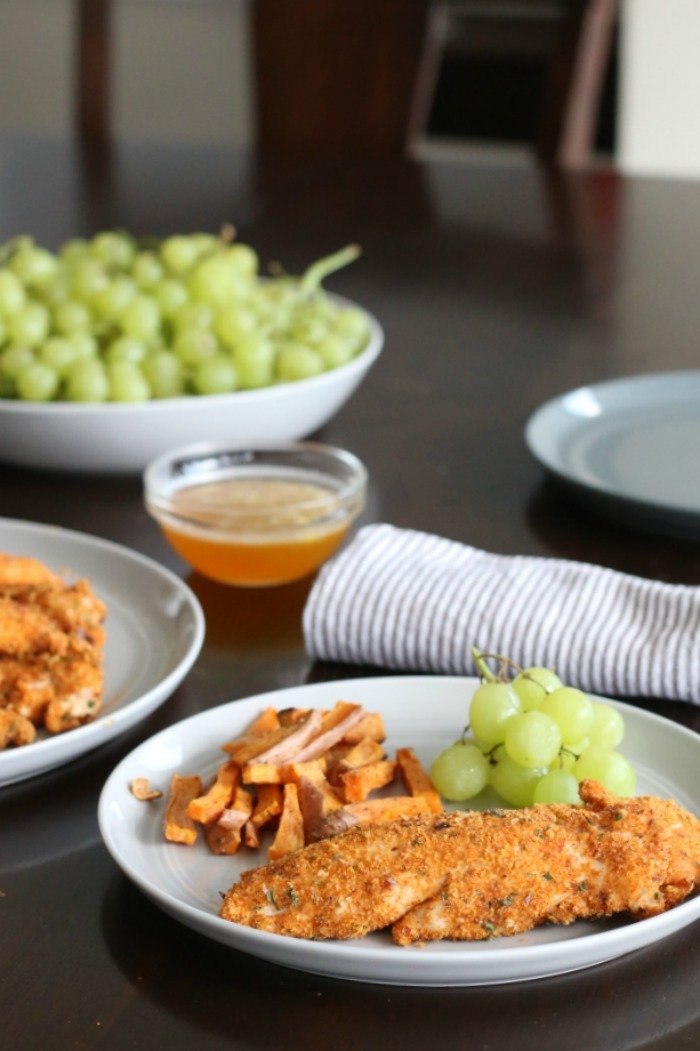 spicy Paleo chicken tenders with sweet citrus sauce vertical