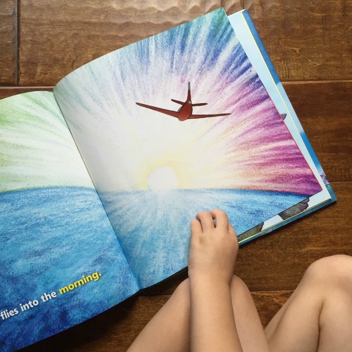 looking-at-the-airplane-book-on-the-floor