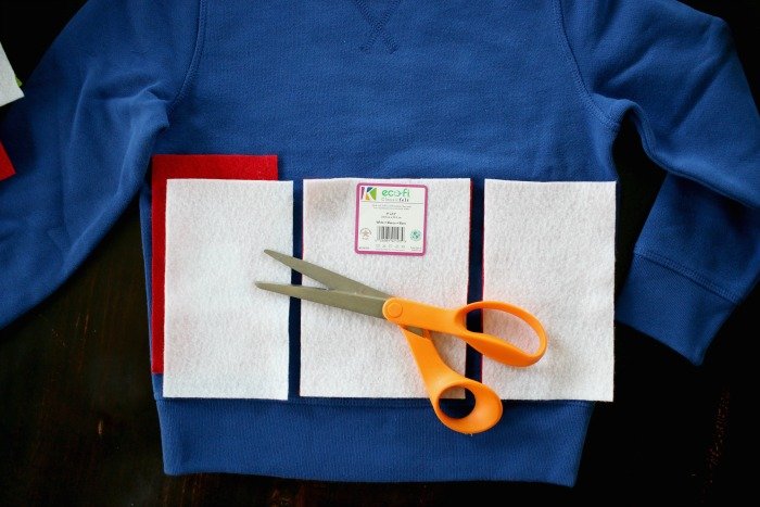 cutting-felt-over-blue-sweatshirt-2