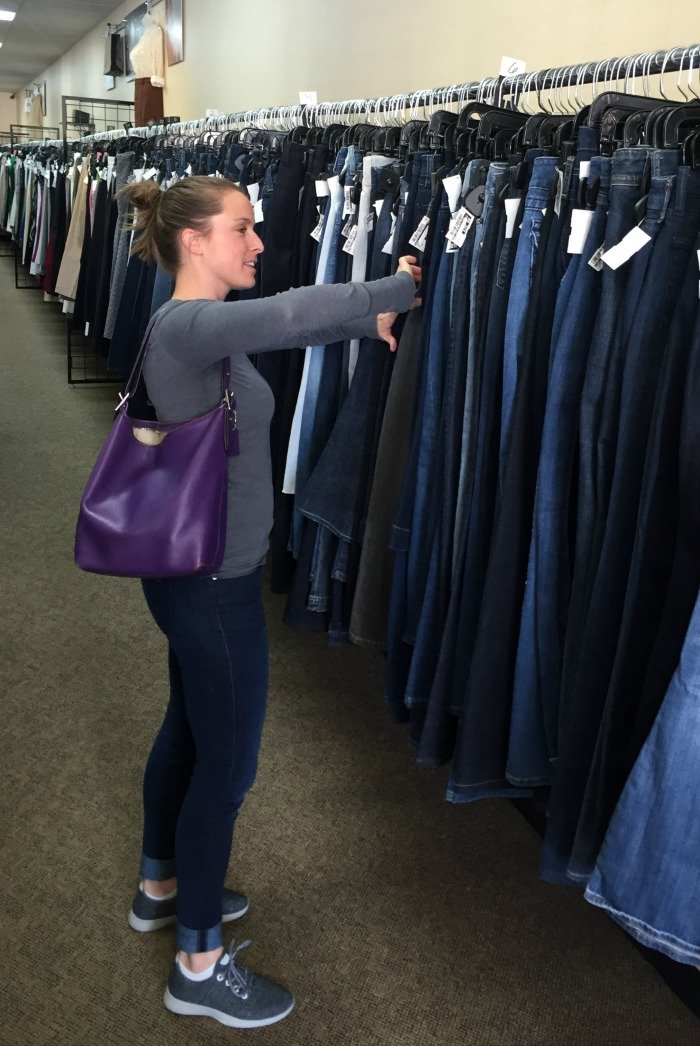 sorting-through-jeans-at-clothes-mentor