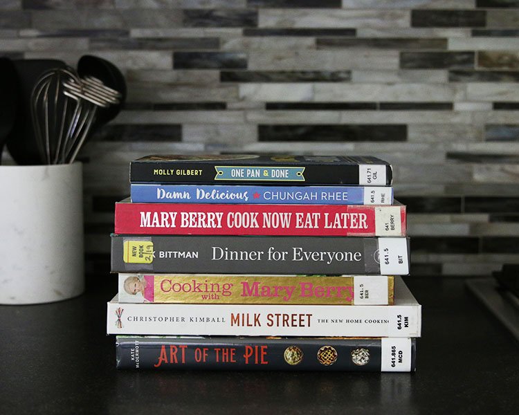 Stuck in a dinner rut and aren't sure where to search for inspiration? Try checking out a few cookbooks from your local library. You benefit from great kitchen-tested recipes, gorgeous photos to pepper your palette, and it costs you nothing. Check out these family-friendly cookbooks definitely worth checking out from your local library.| #HonestlyModern #beginnercooking #librarylove #cookbooks #recipeinspiration