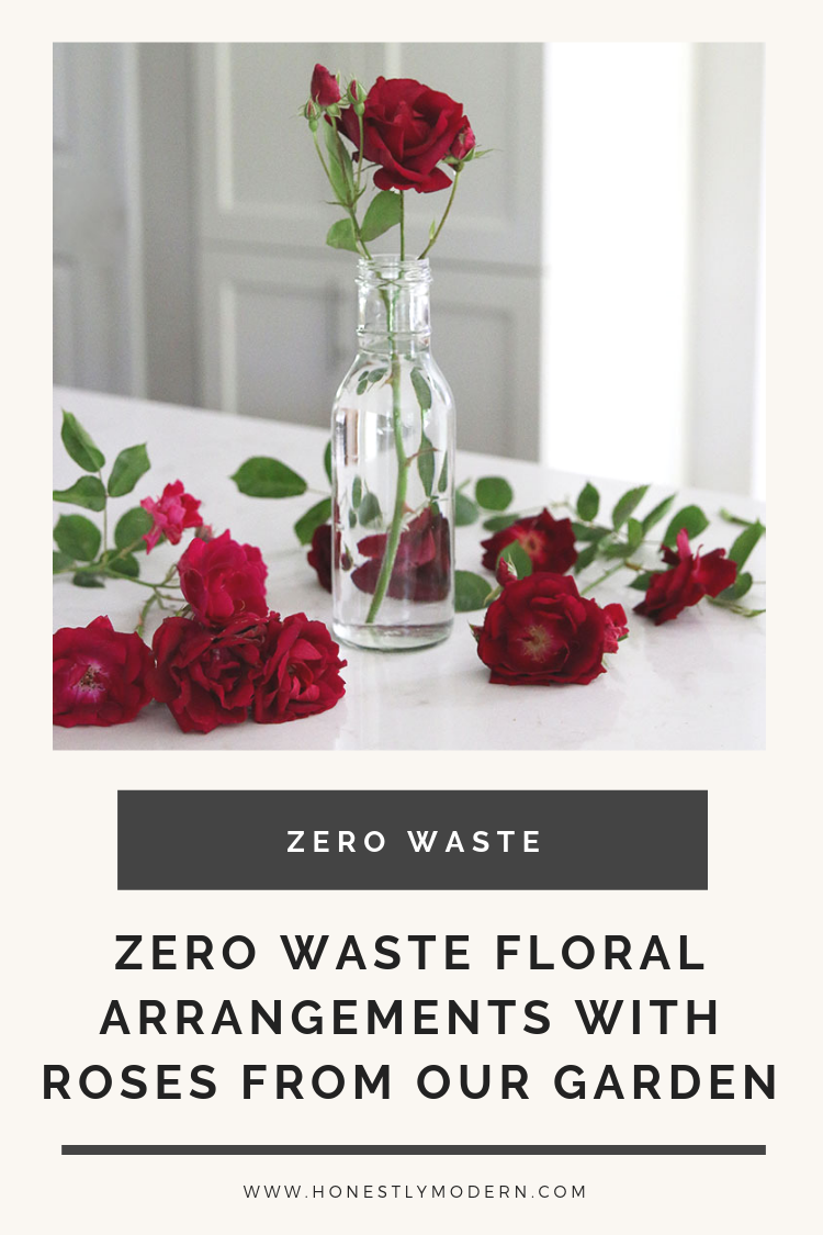 Celebrating simple zero waste wins like this little bouquet of roses, fresh cut from our garden and placed in an upcycled salad dressing bottle turned vase. | #HonestlyModern #familiesdozerowaste #zerowaste #OurHonestGarden