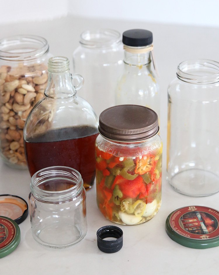 recycled food jars turned storage jars with glass knob tops