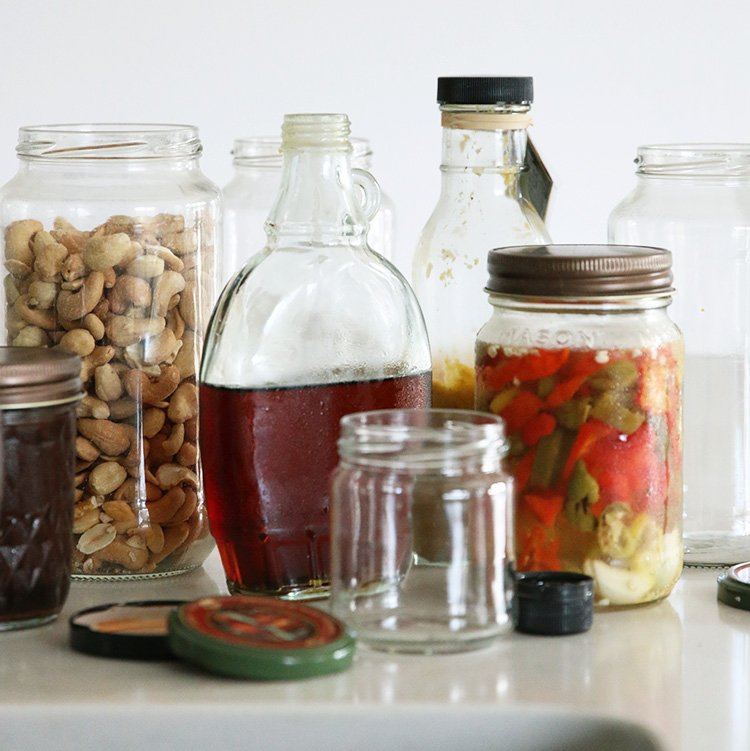 https://www.honestlymodern.com/wp-content/uploads/2020/11/repurposed-glass-jars-on-a-counter-upcycling.jpg