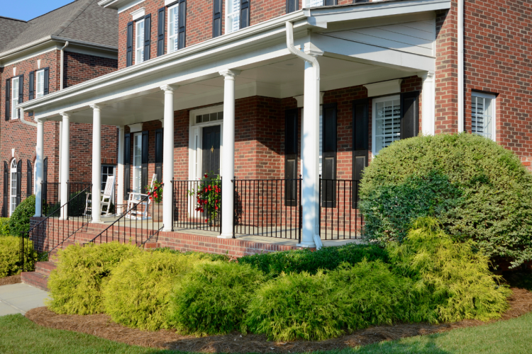 Front side angle view of the front of a single family house. 