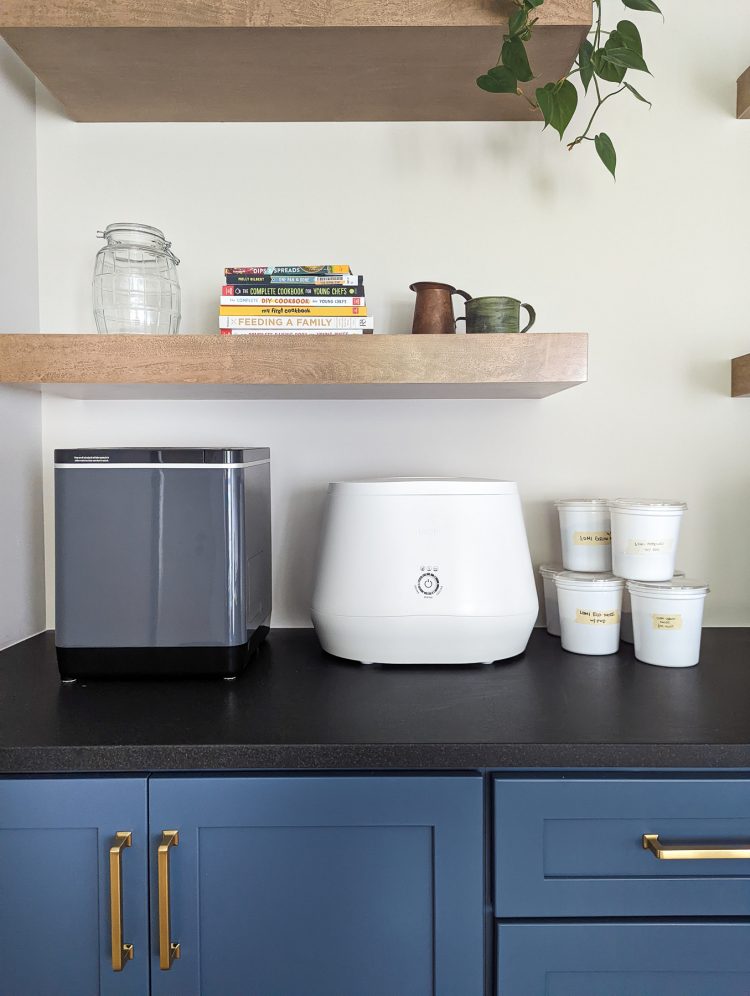 Vitamix FoodCycler and Lomi electric composters on the counter in a home